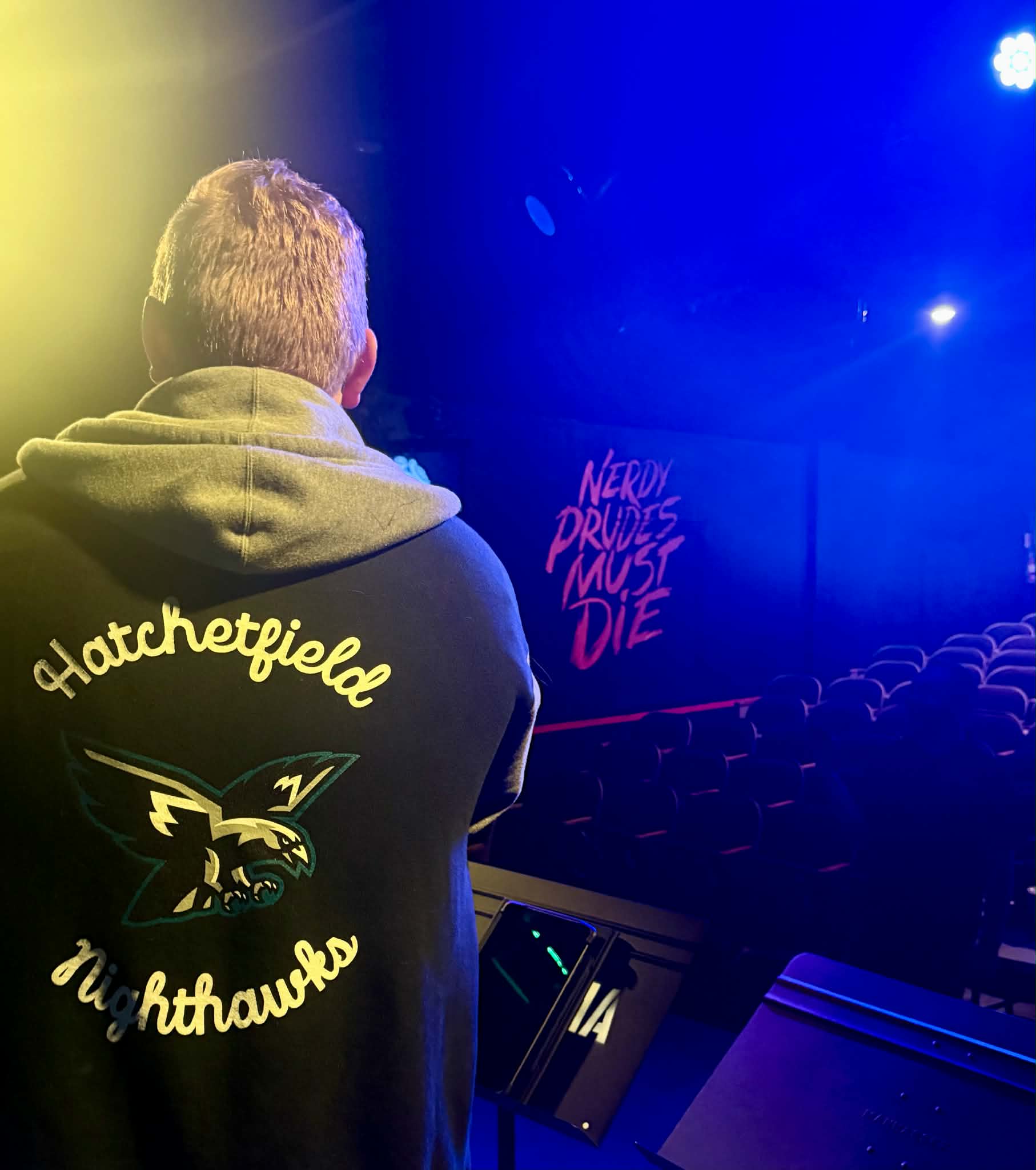 Nerdy Prudes Must Die varsity jacket and logo